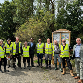 Cllr Glen Sanderson and Cllr Paul Ezhilchelvan in group photo with volunteer group Friends of Valley Park