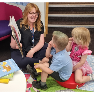 Jodi Cameron, Library and Information Assistant at Alnwick Library, encourages young readers.